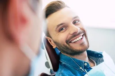 man smiling during his dental visit to Dynamic Dental in Louisville, KY